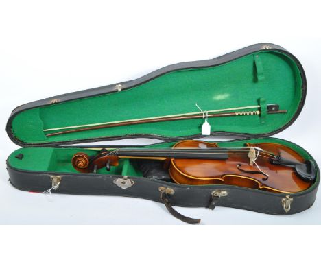 A viola complete in fitted carry case along with a bow and boxed piece of rosin.&nbsp; Case measures approximately 83cm x 28c