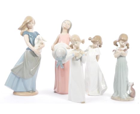 Lladro &amp; Nao - A collection of 20th century Spanish porcelain figurines to include a girl with sun hat, girl with mandoli