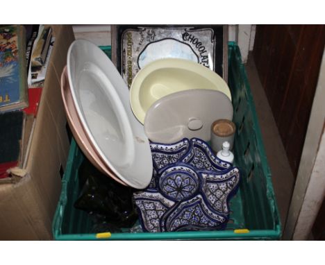 A crate of various china and an advertising mirror