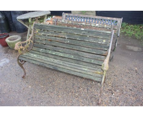 A wooden and metal garden bench 
