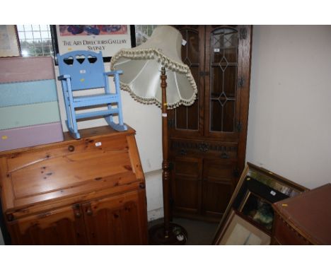 A standard lamp and shade