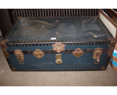 A metal bound travelling trunk