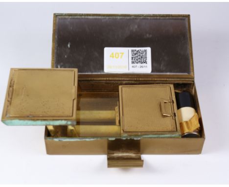 L S Mayer 'Martini' 1940's gilt brass cantilever compact/cigarette box with powder and rouge compartments, cigarettes, lipsti