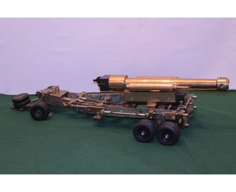 Handcrafted brass and steel model of a Field Gun mounted on six rubber wheels 45cm barrel, 89cm overall Condition Report Clic
