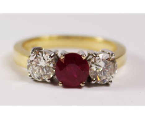 Ruby and diamond three stone gold ring hallmarked 18ct, ruby approx 1.1 carat and diamonds 1.6 carat Condition Report Click h