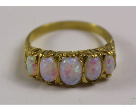 Five stone opal silver-gilt ring Condition Report Click here for further images, condition, auction times & delivery costs