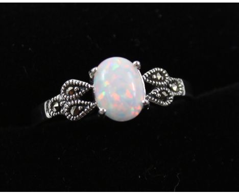 Opal and marcasite ring stamped 925 Condition Report Click here for further images, condition, auction times & delivery costs