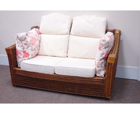 Two piece rattan conservatory suite comprising of - two seat sofa and matching armchair with upholstered loose cushions Condi