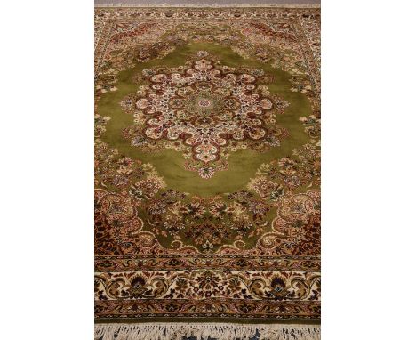 Persian 'Super Kashan' design moss green ground rug carpet, 350cm x 250cm Condition Report Click here for further images, con