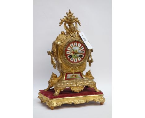 French style gilt metal clock, with Sevres style porcelain panels  CLOCKS & BAROMETERS - as we are not a retailer, these item
