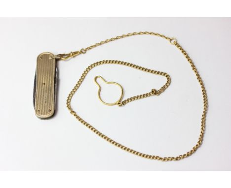 A 9ct gold mounted engine turned pen knife on a curb link chain with swivel 10.5g weighable