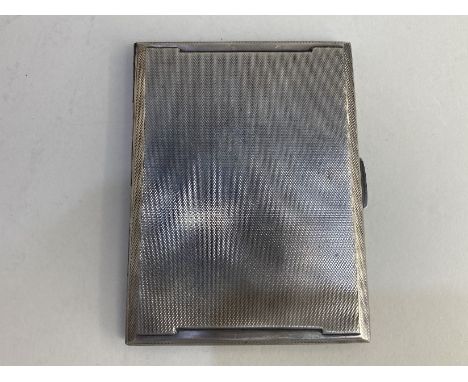 A George VI silver cigarette case, maker Smith &amp; Bartlam, Birmingham 1945, with engine turned decoration, 5.5oz