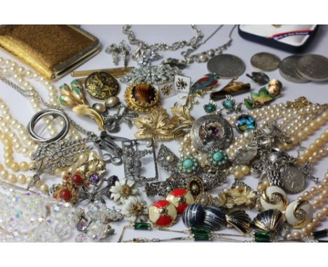 A collection of costume jewellery to include imitation pearl necklace, silver and marcasite brooches, silver charm bracelet, 