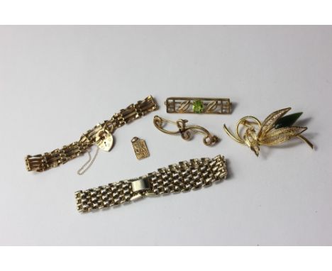 A 9ct gold gate bracelet with padlock clasp, two gem set bar brooches a pendant inscribed 9K Gold, a jade set leaf brooch and