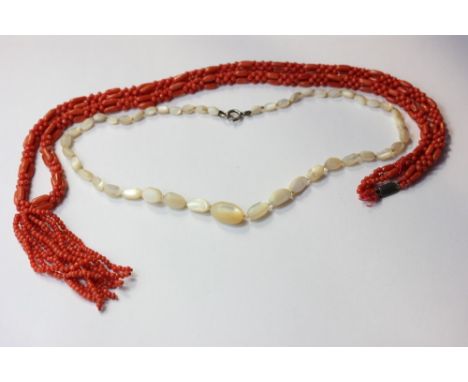 A coral bead necklace and a freshwater pearl necklace