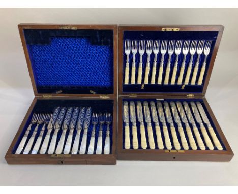 A set of twelve Victorian silver dessert knives and forks, maker Walker &amp; Hall, Sheffield 1900, with carved ivory handles