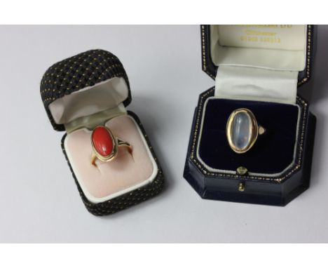 A 9ct gold moonstone ring and a red hardstone 9ct gold ring