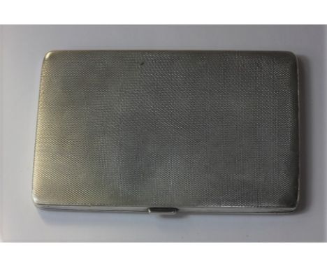 A George V silver cigarette case, maker Wilson &amp; Gill, Birmingham 1933, with engine turned decoration, 6.1oz