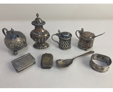 A Victorian silver mustard, maker Walker &amp; Hall, Birmingham 1898, of pierced hexagonal form with blue glass liner and mat