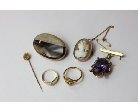 Three various brooches; a stick pin; two gem set rings