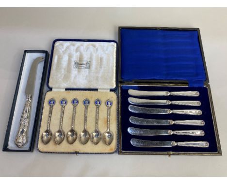 A cased set of six George VI silver coronation coffee spoons, maker Liberty &amp; Co, Birmingham 1936, with enamel finials, t