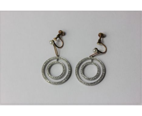 A pair of diamond double hoop earrings the screw fittings each set with a pearl