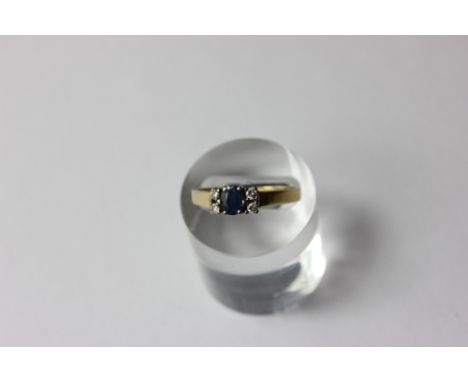 A sapphire and diamond five stone ring