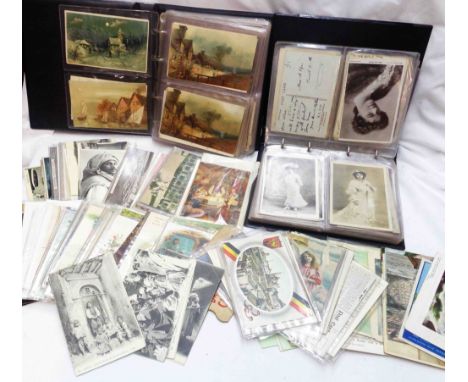 Two ring bound albums containing a collection of early 20th Century and other postcards including Hold to Light, greetings, a