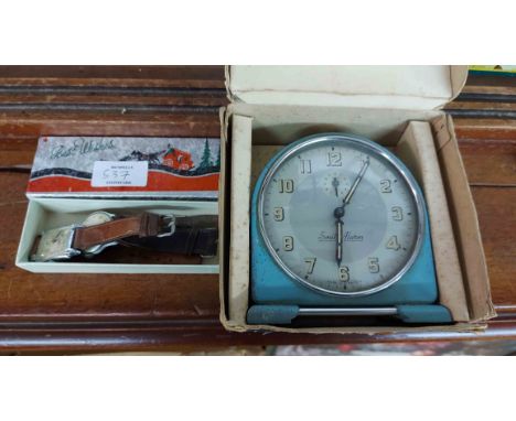 A boxed mid 20th Century Smiths alarm clock and two vintage wristwatches - all a/f