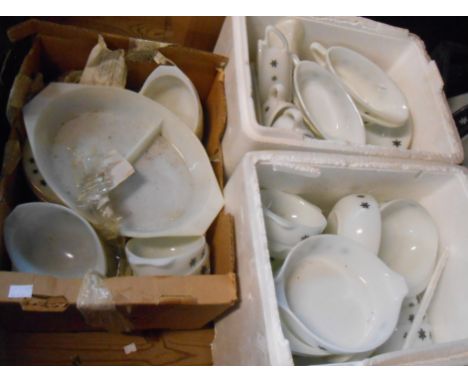 Eight boxes containing a large quantity of vintage Pyrex oven to table ware decorated predominantly in Black on White Snowfla
