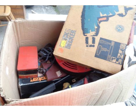 A box containing a quantity of assorted tools including boxed Black &amp; Decker heat gun, sander, etc.