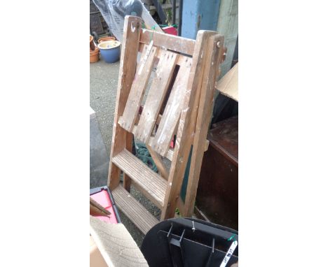 A vintage wooden folding stepladder - for decorative use only
