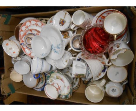 A box containing a quantity of assorted ceramic items including Thoune cup and saucer, commemorative mugs, etc.