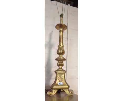 A modern giltwood torchere pattern table lamp