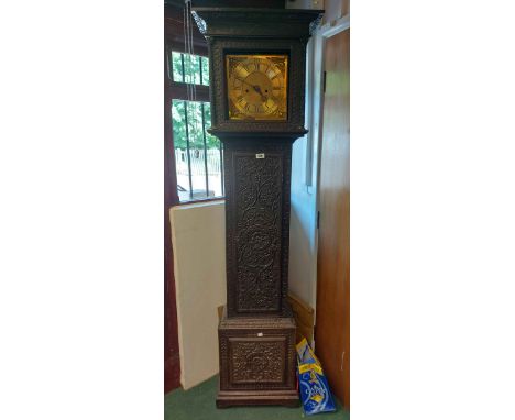 A 19th Century carved oak longcase clock, with 28.5cm brass square dial and eight day bell striking movement