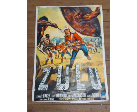 An unframed rolled vintage poster print for the movie 'ZULU' - sold with a monochrome poster print of Laurel &amp; Hardy - va