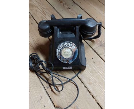 A vintage AEP black Bakelite desk telephone