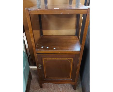 A 48cm Edwardian mahogany and strung nightstand with raised top surface, shelf and panelled cupboard under, set on square leg