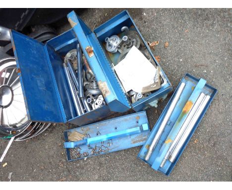 Two metal toolboxes containing a quantity of pipe bending and other tools