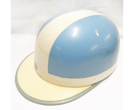 A vintage Clipper motorcycle helmet in powder blue and white colourway