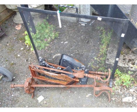 A vintage pierced steel fire guard - sold with a quantity of assorted fire furniture