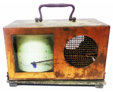 An old copper cased small barograph machine with clockwork mechanism marked for Aspec