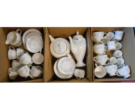 A quantity of Wedgwood bone china tea and coffee ware in the Belle Fleur pattern including teapot, coffee pot, cups, saucers,