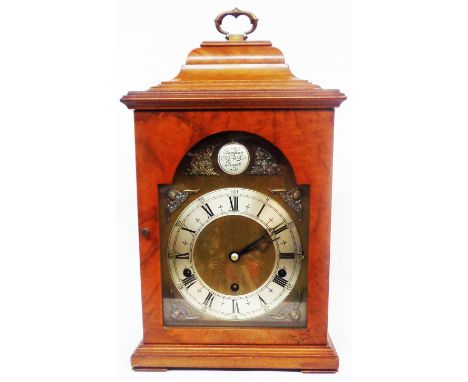 A 20th Century walnut cased bracket clock with dial marked for retailer Asprey and with Elliott of London eight day Westminst