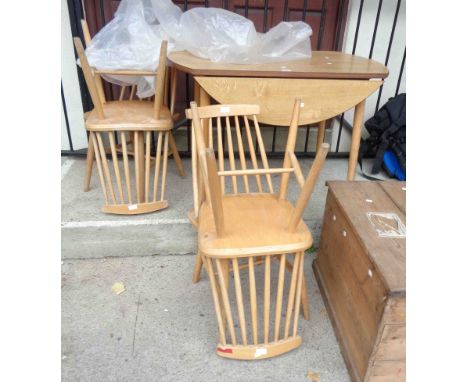 A 1.07m Mid 20th Century oak effect drop leaf dining table - sold with a set of four Ercol style dining chairs