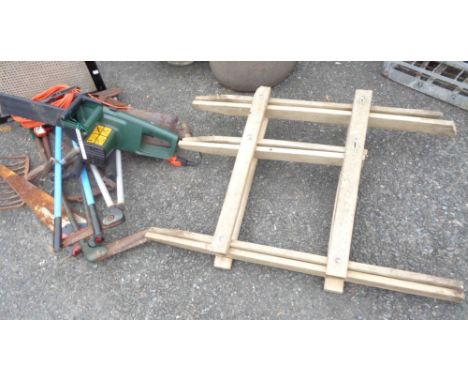 A Black &amp; Decker GK430/H2 electric chainsaw - sold with a quantity of garden hand tools and a Stihl wooden sawhorse