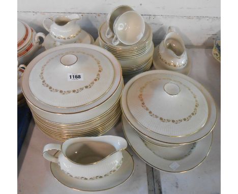 A quantity of Royal Doulton bone china tea and dinner ware decorated in the Fairfax pattern including vegetable tureens, cups