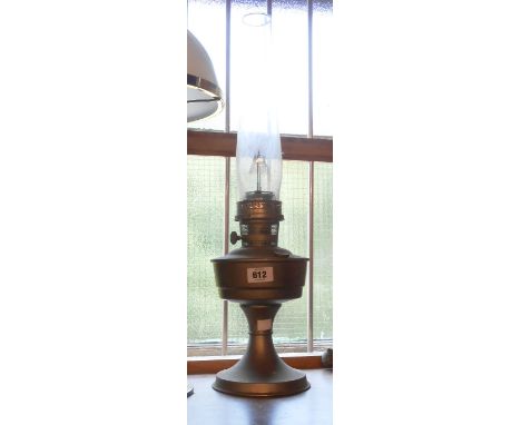 A vintage Aladdin No.21 metal oil lamp with glass chimney