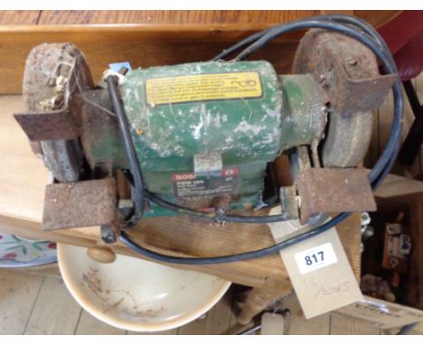 A Bosch PSM 125 300w bench grinder with 125mm diameter grinding wheels