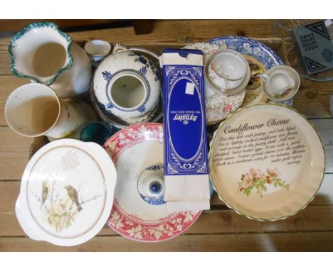 A box containing a quantity of glass and ceramic items
